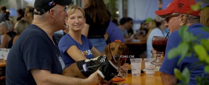 People enjoying beer garden at Krause's Cafe with a dog